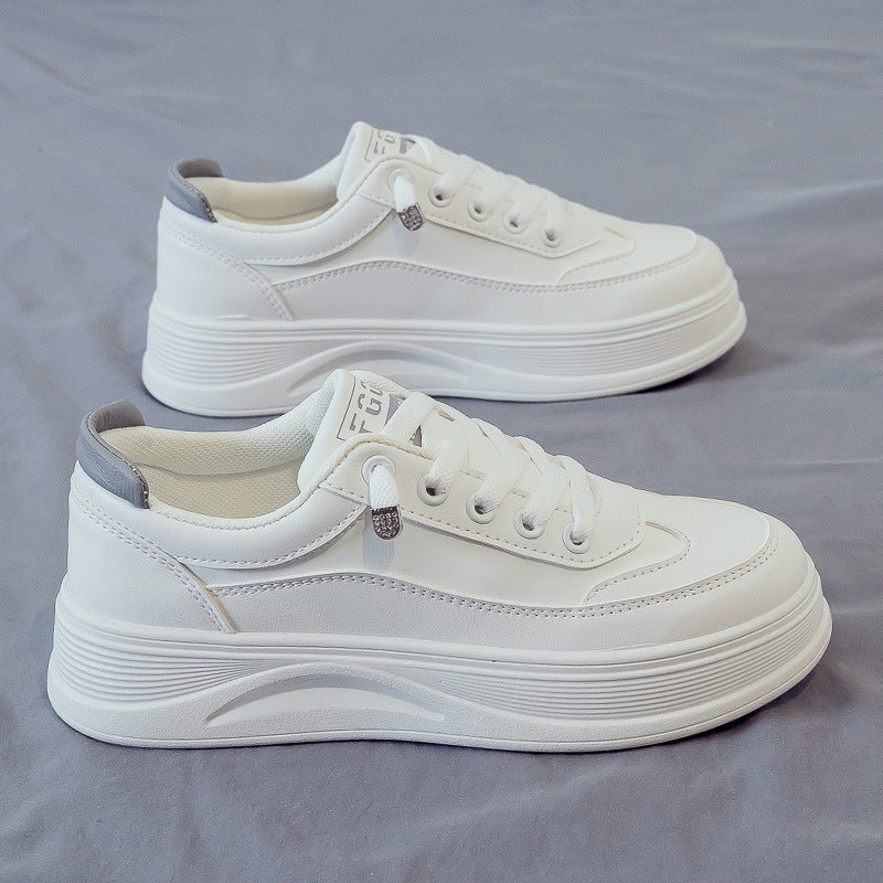 Zapatos de trabajo blancos de suela gruesa y de moda