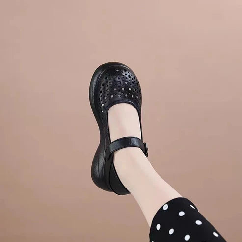 Crocs de punta redonda de cuero genuino